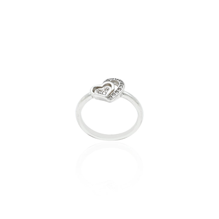 Elegant silver ring with a heart-shaped motif, perfect for expressing love and style.