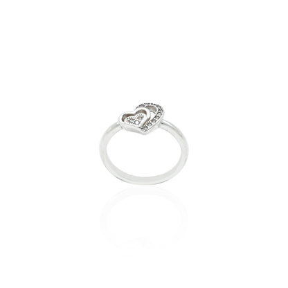 Elegant silver ring with a heart-shaped motif, perfect for expressing love and style.