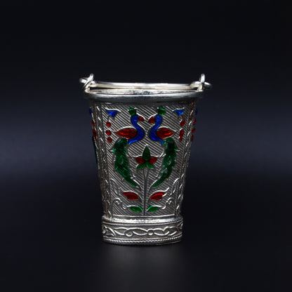 Elegant peacock design silver bucket, adding a touch of grace to your worship rituals.