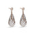 Layered Teardrop Silver Dangle Earrings with a Unique Textured Pattern