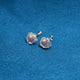 Stylish silver earrings designed as roses in a vibrant purple shade