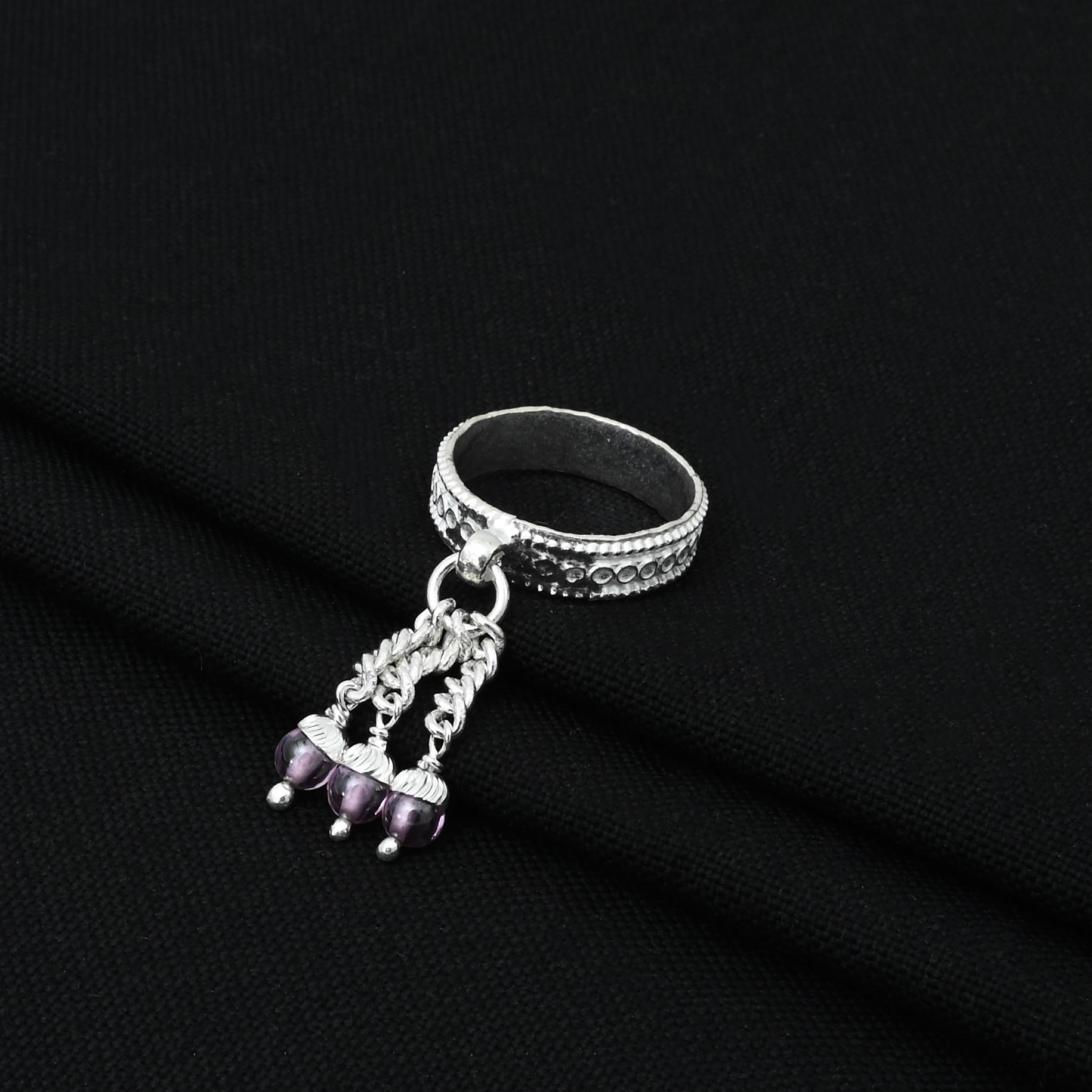 Stylish silver ring showcasing radical light pink beads, perfect for a trendy touch