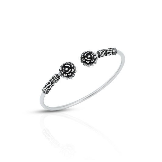 Silver kada featuring a floral design with titanium color accents