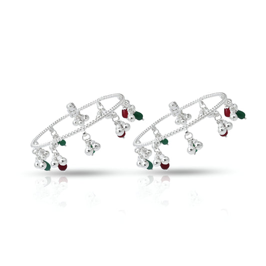 Silver ghungroo kada payal set for girls, featuring traditional embellishments.