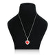 Heart-shaped pendant with stones on a sleek chain