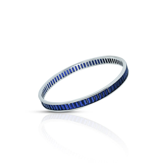 Silver bangles adorned with royal blue stones