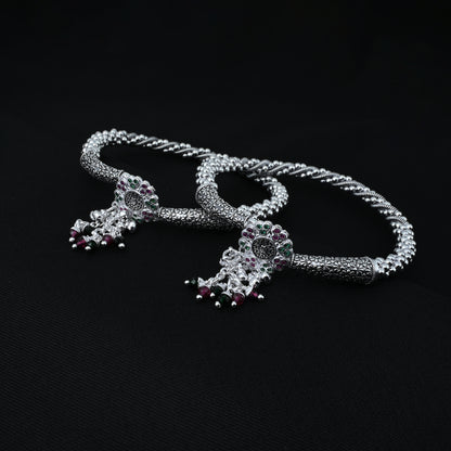 Elegant silver kada payal with flower motif and hanging bells