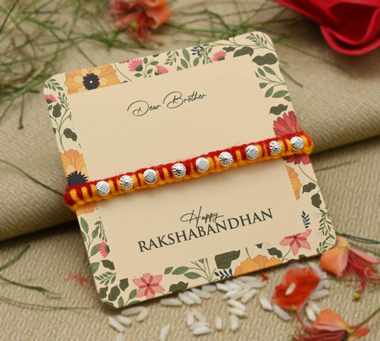 Silver Rakhi featuring a unique beads design, perfect for boys.