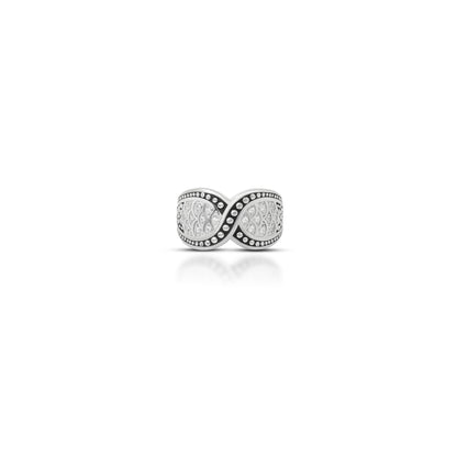 Elegant silver infinity ring embellished with sparkling white stones.