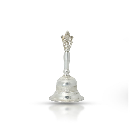 Exquisite silver puja bell, beautifully designed for use in worship and spiritual rituals.