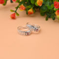Silver Toe Ring with Intricate Detailing and Pink Stone