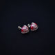 Pearl-studded silver earrings with vibrant red gemstones