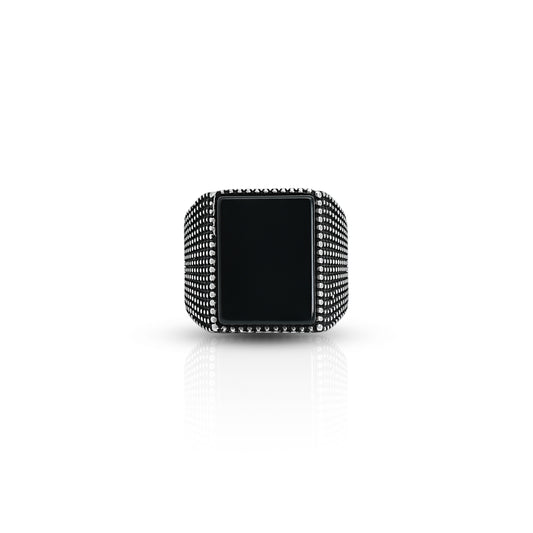 Stylish silver ring for men featuring a bold black rectangular stone centerpiece