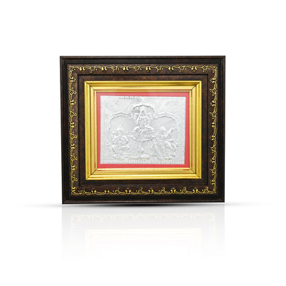 Beautiful 999 silver photo frame featuring Lakshmi, Saraswati, and Ganesha idols, perfect for spiritual spaces