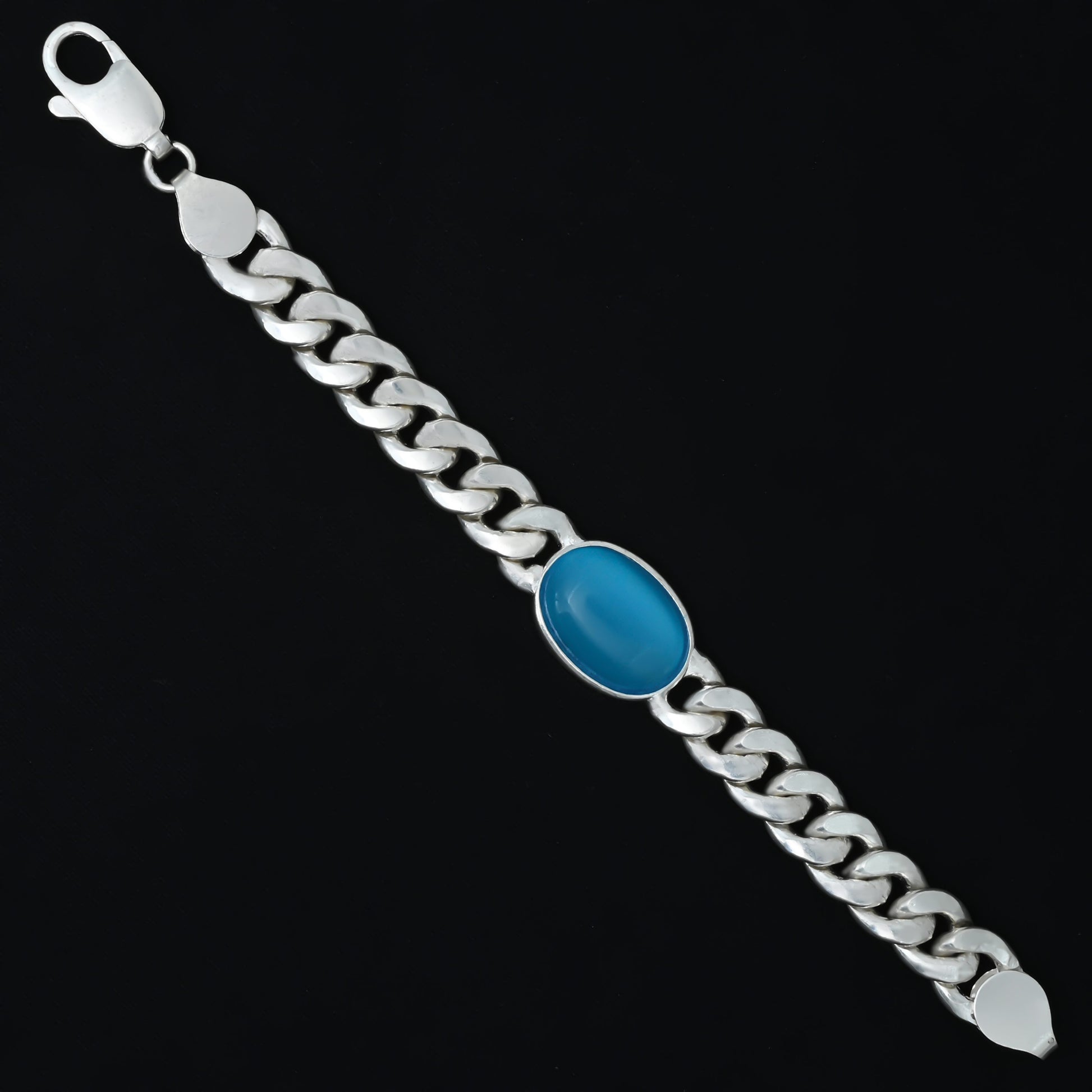 Silver bracelet for men with a central blue stone and intricate chain pattern