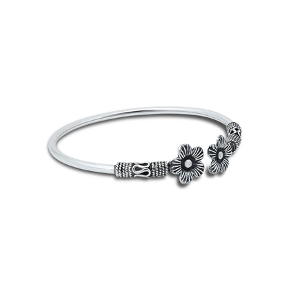 Elegant floral motif bangle made of oxidized silver