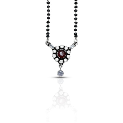 Elegant sterling silver mangalsutra with a stunning round maroon gemstone centerpiece