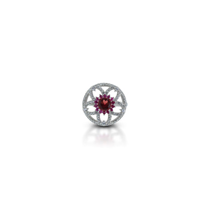 Silver ring with flower design and colorful gemstone accents.