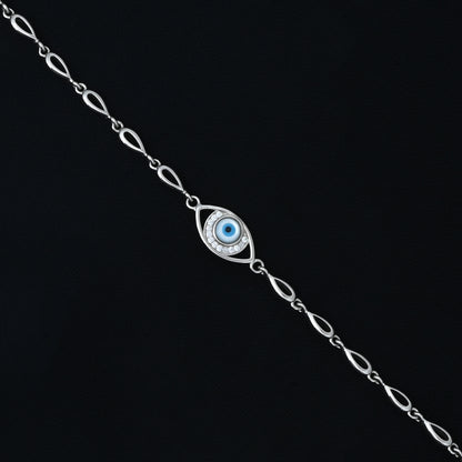 Sleek silver evil eye bracelet, a modern take on the traditional protection charm with minimalist design.