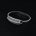 Silver kada for women, adorned with black stones