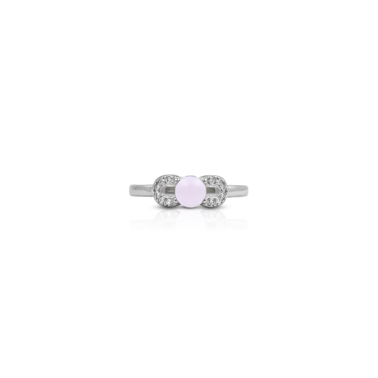 Silver ring featuring a light pink stone in an elegant infinity design