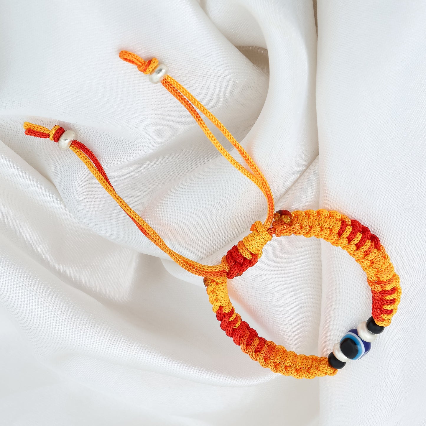 Silver Evil Eyes Adjustable Orange Dhaga Bracelet