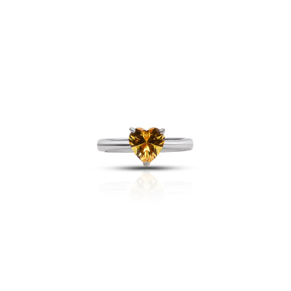 Sterling silver ring featuring yellow heart-shaped stone.