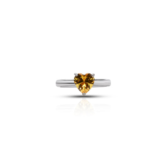 Sterling silver ring featuring yellow heart-shaped stone.