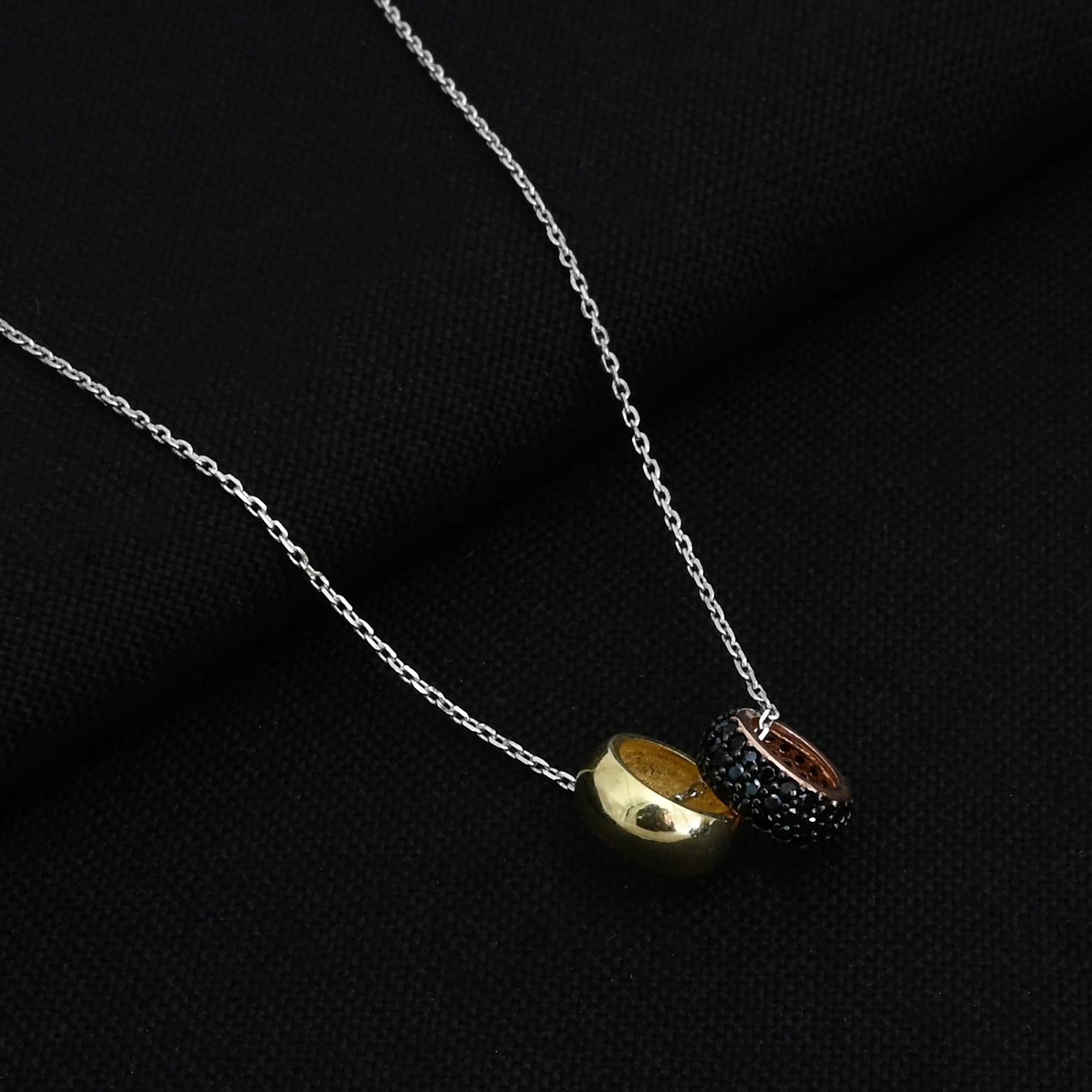 Elegant silver chain with two pendants for women.