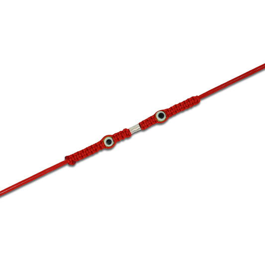 Boys' Rakhi with two protective green evil eye charms in silver.