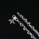 Elegant silver anklet featuring tiny colorful heart accents