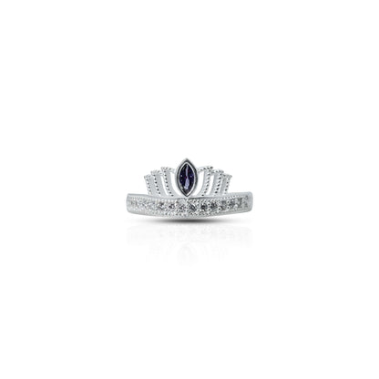 Silver girls' ring featuring a purple gemstone at the center, surrounded by a crown design for a regal touch.