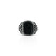 Sterling silver ring featuring an engraved design with a bold black stone centerpiece.