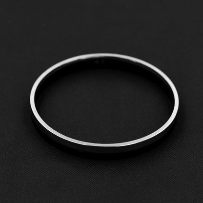 Elegant black and silver men's kada with a bold, modern style