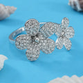 Silver Ring with Two Flowers and Sparkling White Crystals.