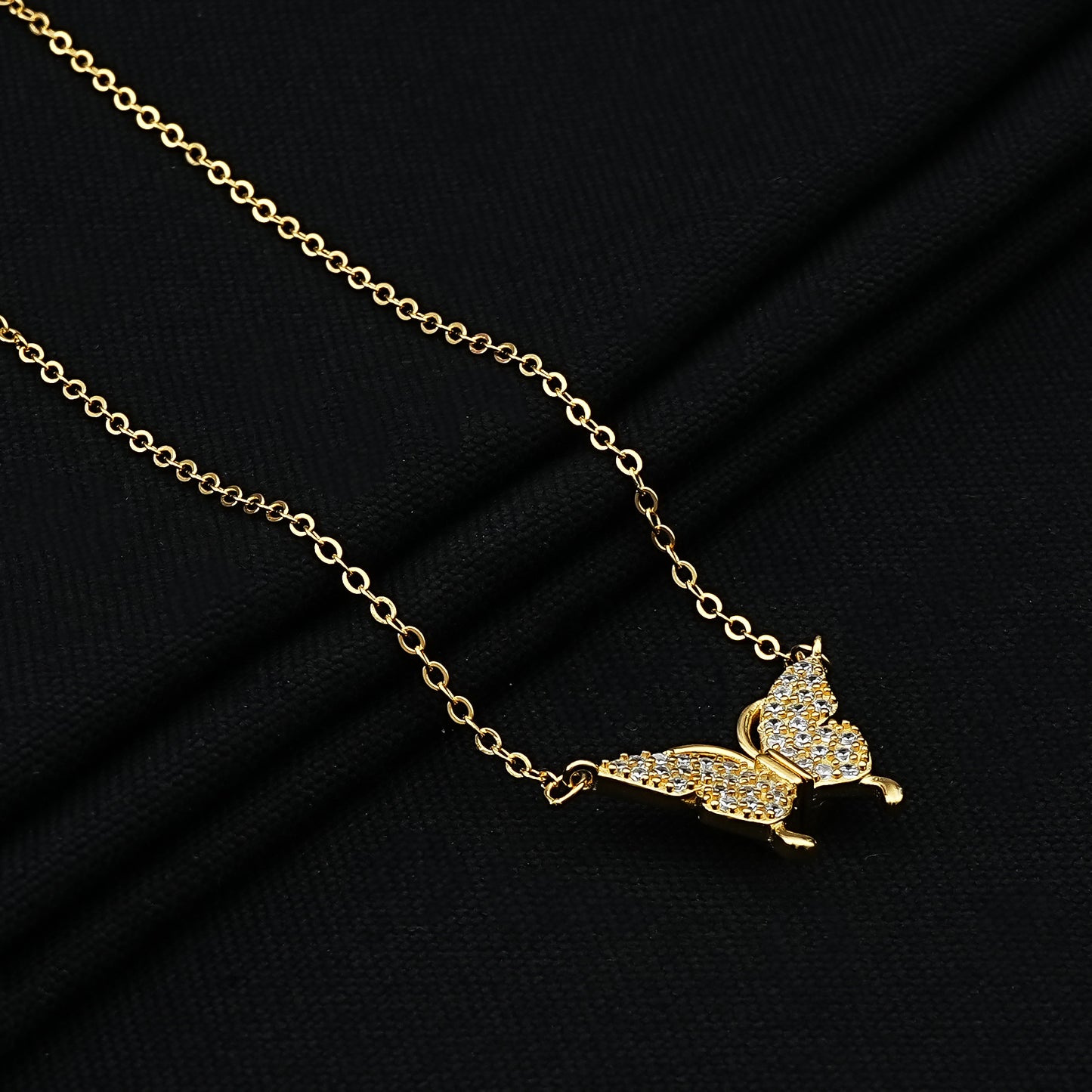 Chic gold plated butterfly pendant on a delicate chain