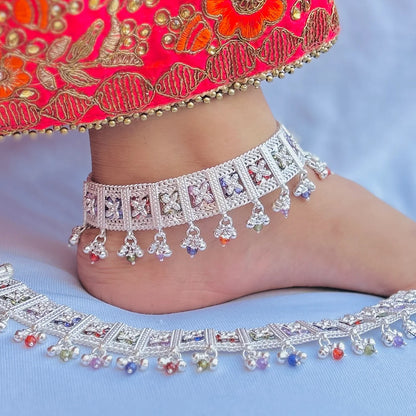 Sophisticated silver payal featuring a classic floral pattern, perfect for traditional occasions