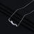 Elegant silver chain pendant with a modern curve