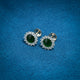 Stylish silver earrings with eye-catching green stone studs