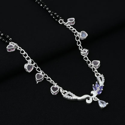 Timeless silver mangalsutra adorned with a heart motif and a captivating purple stone