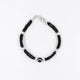 Stylish sterling silver bracelet for girls showcasing a black evil eye and black beads for protection