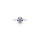 Elegant sterling silver floral ring with purple and white stones.