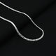 Elegant silver pendant with minimalist design for men’s chain.