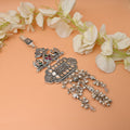 Vintage-Inspired Silver Keychain with Traditional Artwork Design