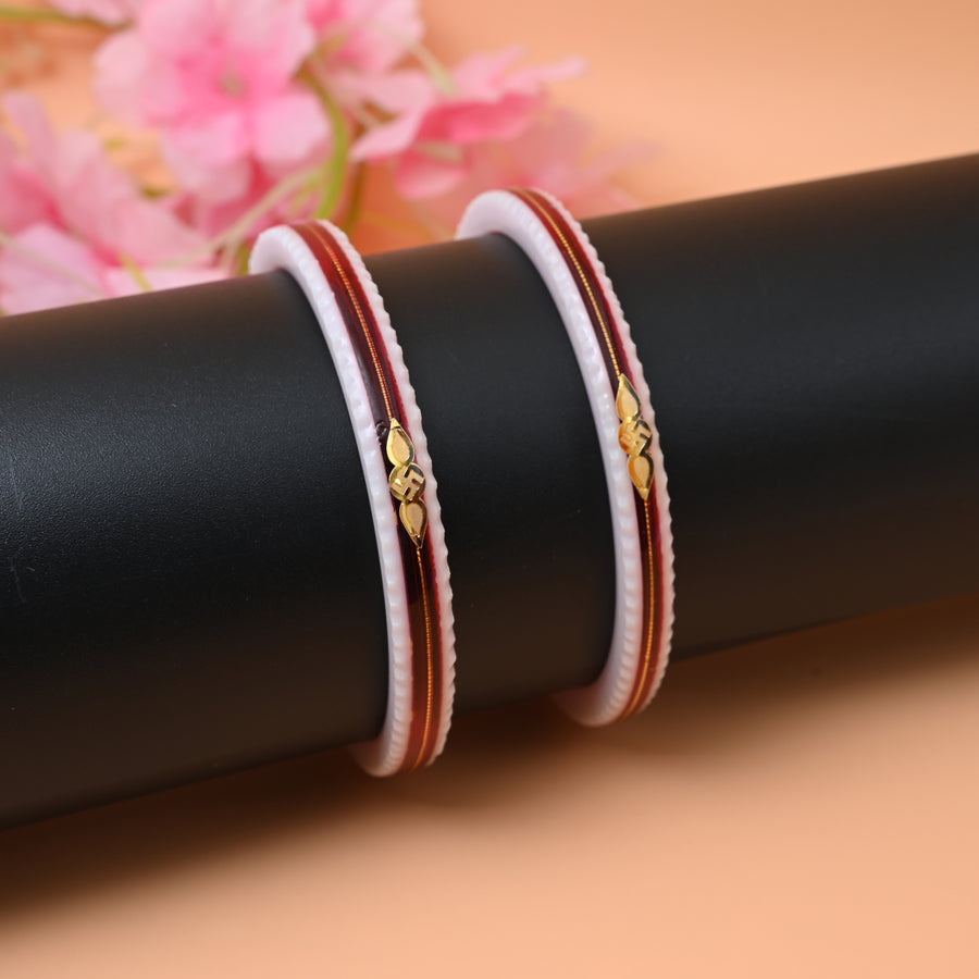 Gold Small Swastika Design light and Dark Red Bangle.
