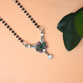 Modern Silver Mangalsutra Featuring Pendant with Array of Shaped Stones.