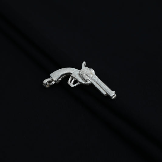 Charming silver pendant designed as a gun, perfect for boys
