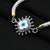 Silver bracelet with a sleek evil eye motif, offering both fashion and protection