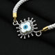 Silver bracelet with a sleek evil eye motif, offering both fashion and protection