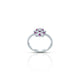 Charming sterling silver floral ring featuring purple and white gemstones.